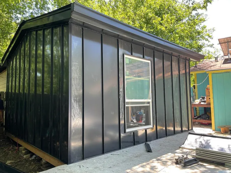 Black standing seam metal wall panels for Roof Inspection in San Jacinto