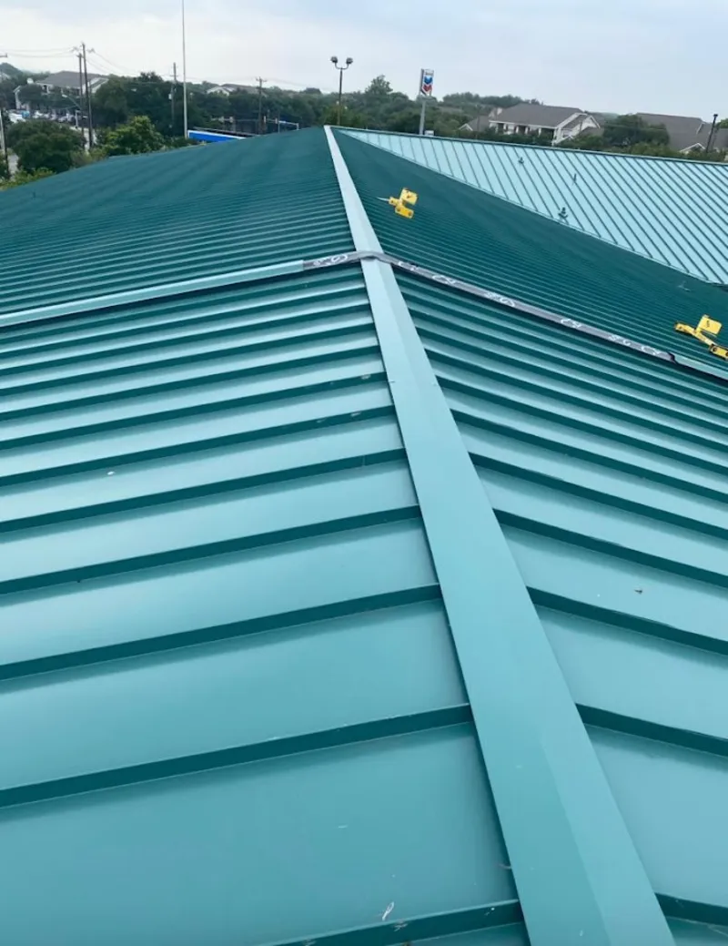 Green commercial metal roof ridge and valley for Metal Roof Repair in San Jacinto