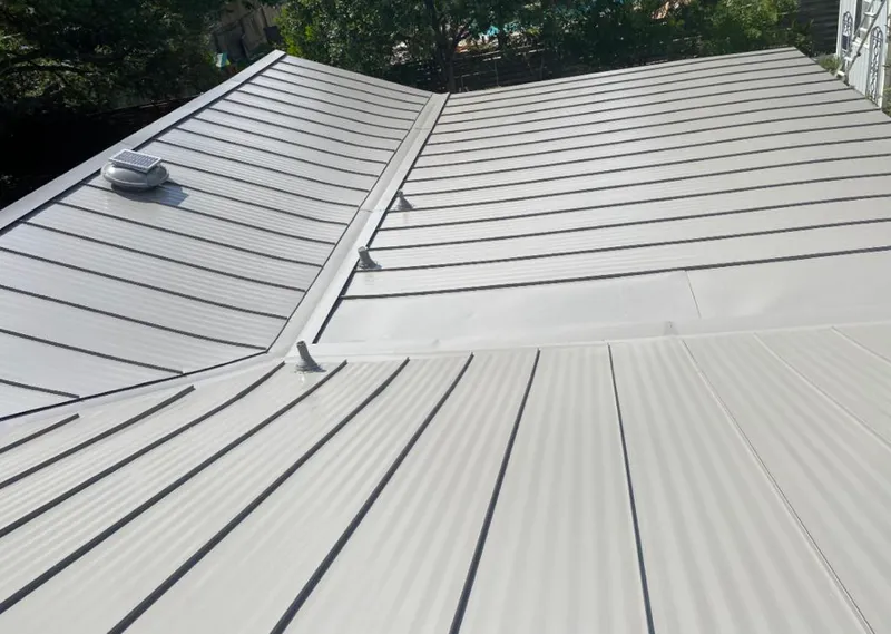 Solar attic fan installed on a metal roof for Roof Ventilation in San Jacinto